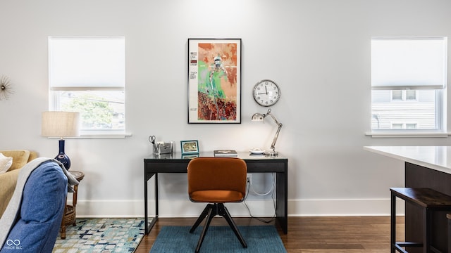 office space with dark hardwood / wood-style floors