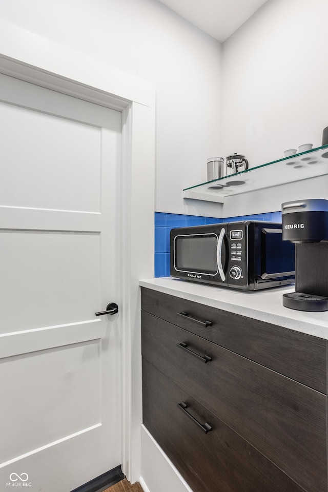 interior space featuring dark brown cabinets