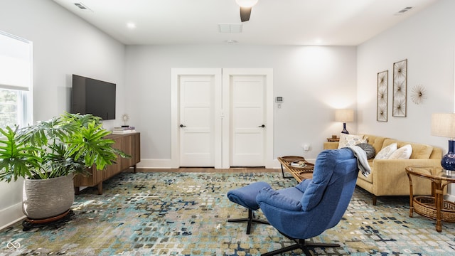 living room featuring ceiling fan