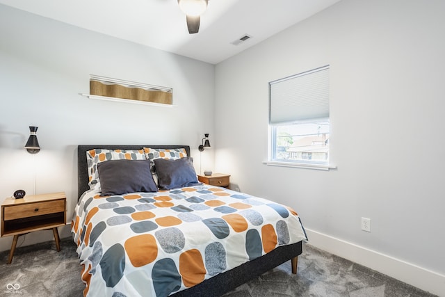 bedroom featuring ceiling fan and carpet floors