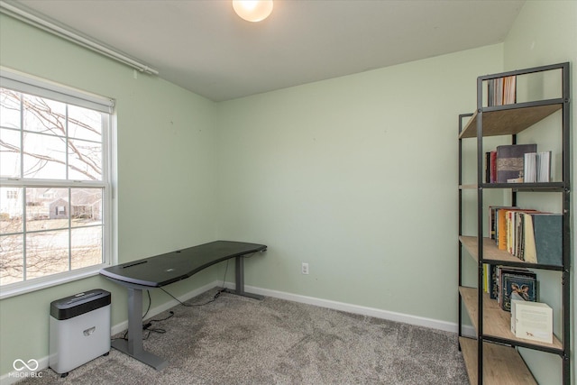 office area with carpet flooring and baseboards