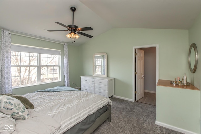 bedroom featuring a ceiling fan, vaulted ceiling, carpet, and baseboards