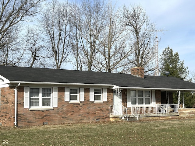 ranch-style house with a front lawn