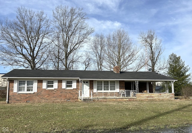 ranch-style house with covered porch and a front lawn