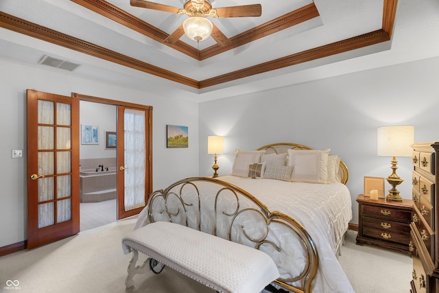 carpeted bedroom with a raised ceiling, crown molding, ceiling fan, and french doors