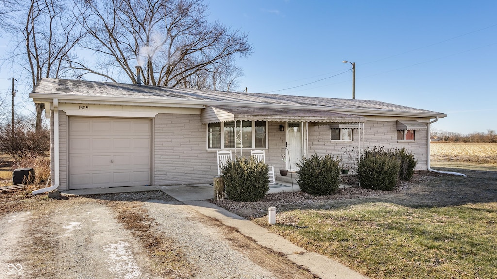 single story home with a garage