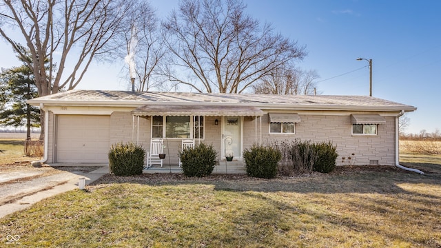 ranch-style home with a garage and a front lawn