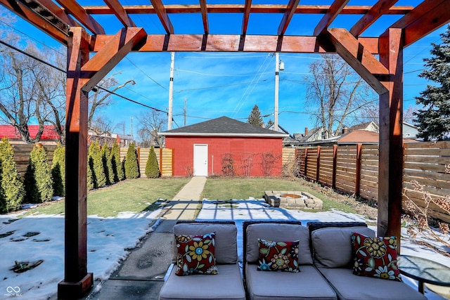 view of patio / terrace with an outdoor structure, a pergola, and a fire pit