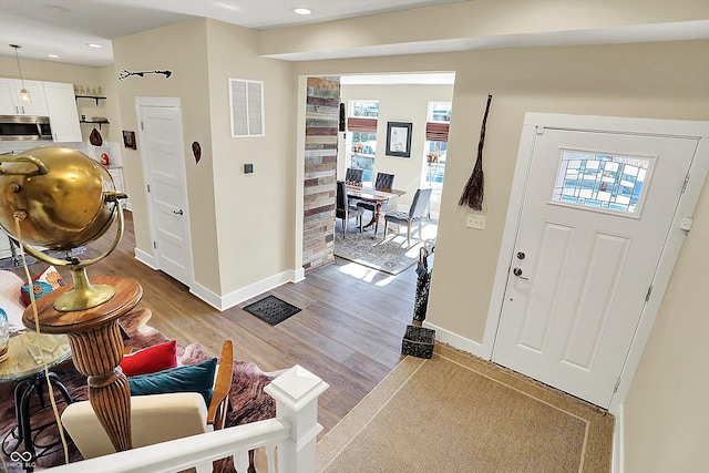 entrance foyer with light wood-type flooring