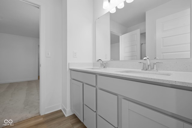 bathroom featuring vanity and hardwood / wood-style flooring