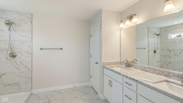 bathroom featuring vanity and a tile shower