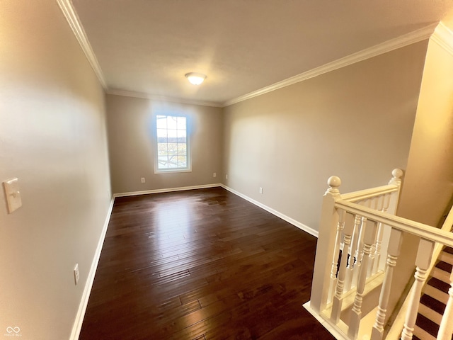 unfurnished room with crown molding and dark hardwood / wood-style floors