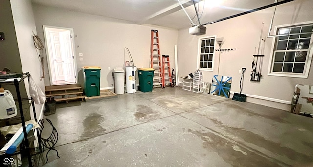 garage featuring a garage door opener and electric water heater