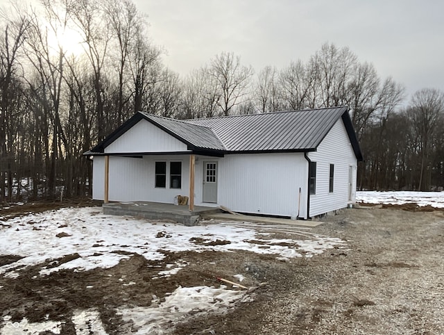 view of front of home featuring covered porch