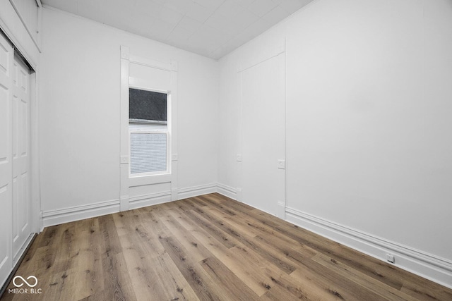 unfurnished room featuring light hardwood / wood-style flooring