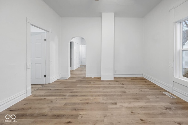 unfurnished room with light hardwood / wood-style flooring