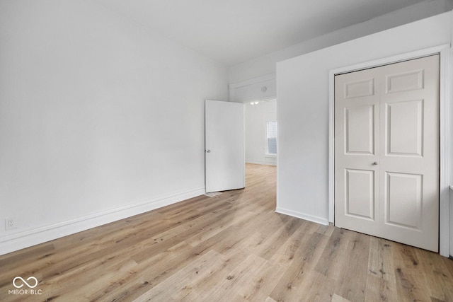 unfurnished bedroom with light hardwood / wood-style flooring