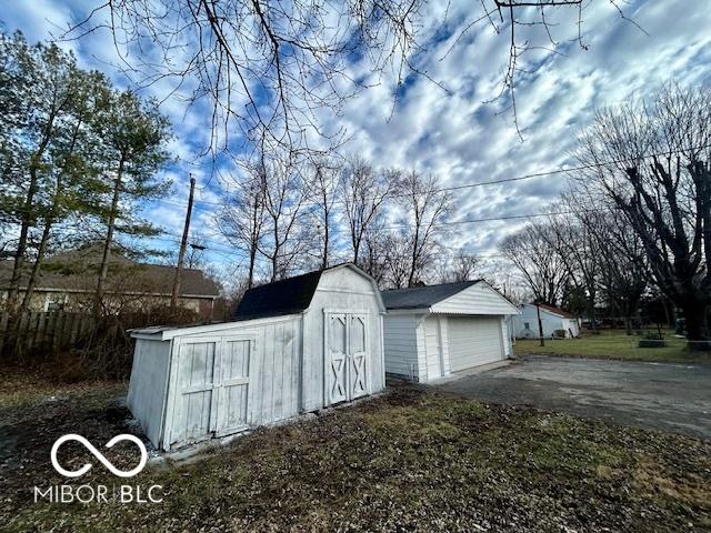 view of outbuilding with a garage