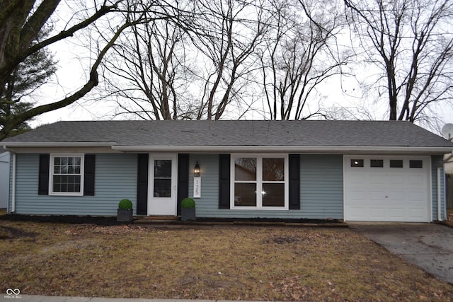 single story home with a garage