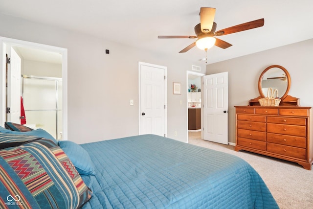 bedroom featuring a ceiling fan, light carpet, visible vents, and baseboards