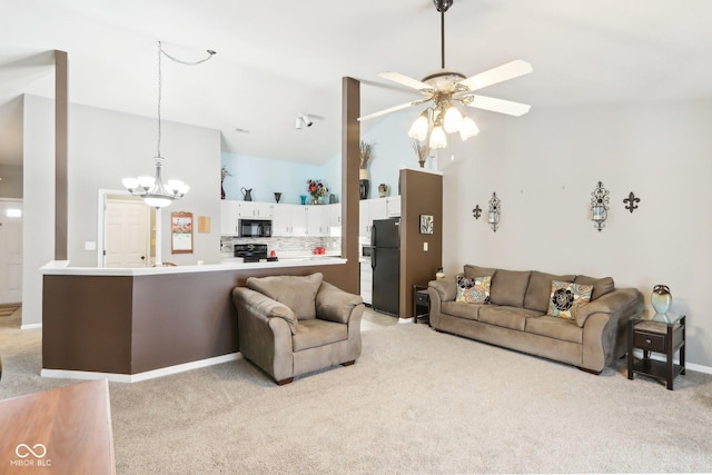 living area with light carpet, baseboards, high vaulted ceiling, and ceiling fan with notable chandelier