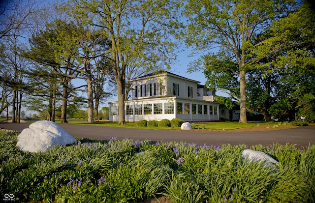 exterior space with a sunroom