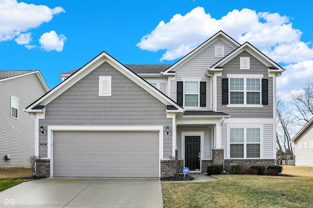 craftsman-style home with a garage and a front yard