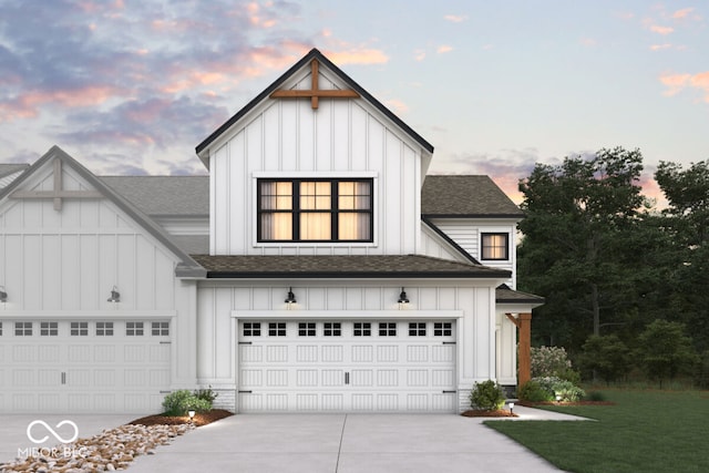 modern farmhouse style home with driveway, a garage, board and batten siding, and roof with shingles