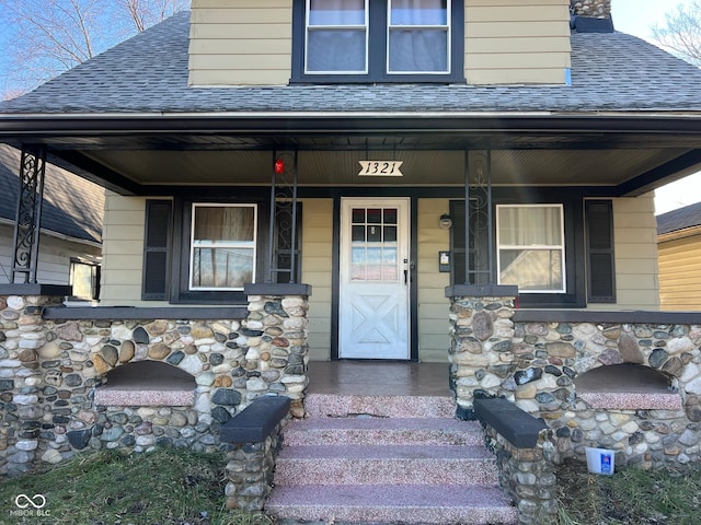 entrance to property with a porch