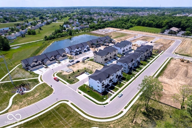 aerial view with a water view and a residential view