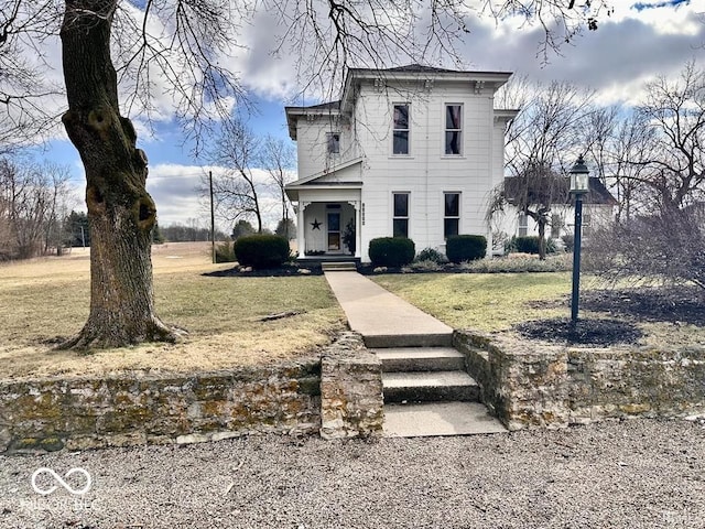 view of front of house featuring a front yard