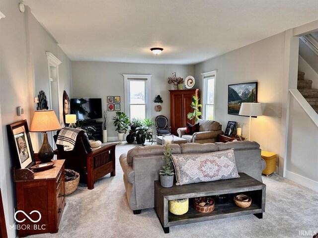 12801 E Edgewater Rd, Albany, IN 47320 - living room with light colored carpet and stairs