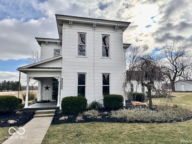 view of front of home with a front yard