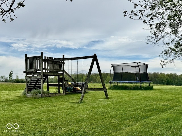 12801 E Edgewater Rd, Albany, IN 47320 - view of playground featuring a trampoline and a yard
