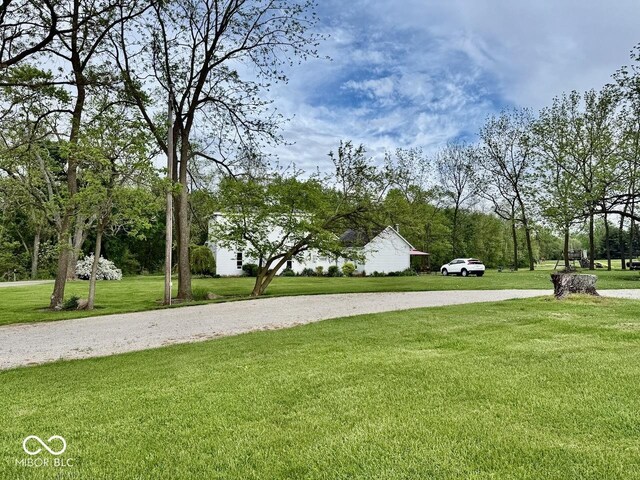 12801 E Edgewater Rd, Albany, IN 47320 - view of home's community featuring a yard