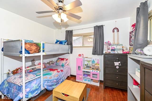 bedroom featuring dark hardwood / wood-style floors and ceiling fan