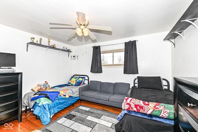 interior space with ceiling fan and hardwood / wood-style floors