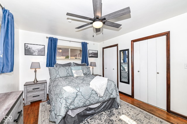 bedroom with ceiling fan and dark hardwood / wood-style flooring