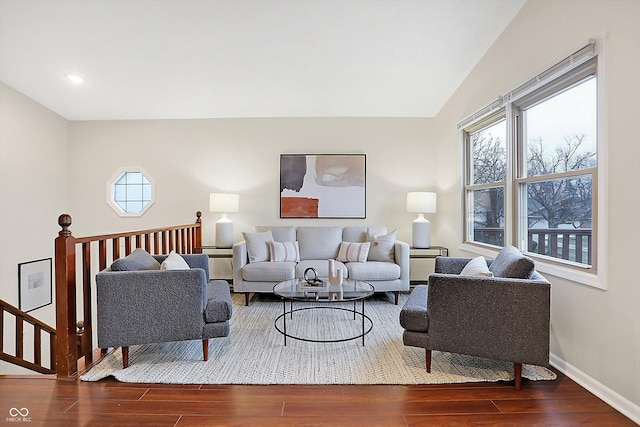 living room featuring dark wood-type flooring