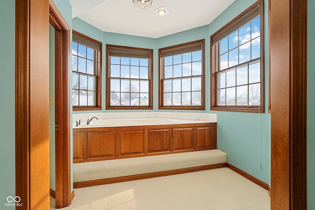 bathroom featuring baseboards