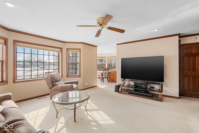 living room featuring crown molding, baseboards, and light colored carpet