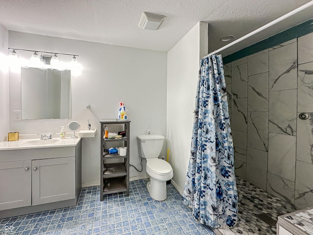 bathroom with vanity, a shower with curtain, a textured ceiling, and toilet