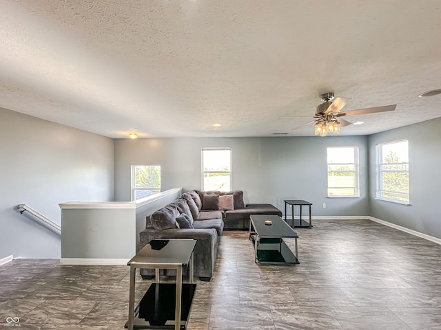 living room with a textured ceiling