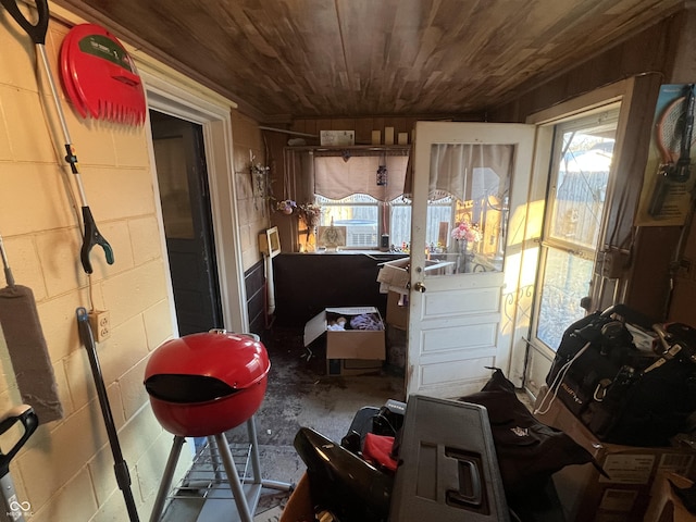 misc room with a wealth of natural light and wooden ceiling