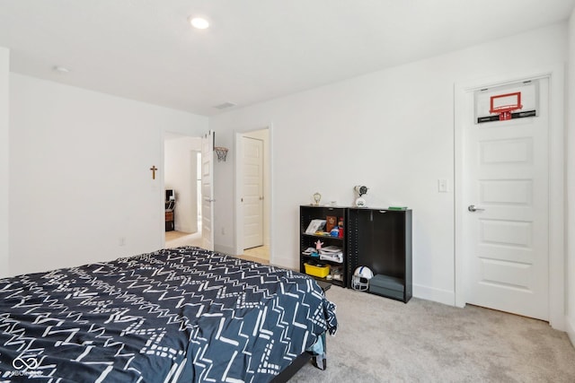 bedroom featuring carpet