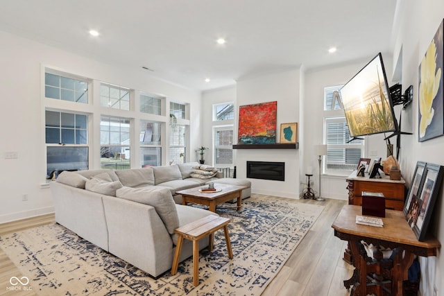 living room with light hardwood / wood-style floors