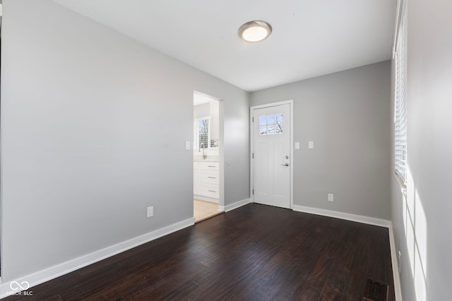 entrance foyer featuring hardwood / wood-style flooring