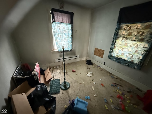interior space with a baseboard radiator
