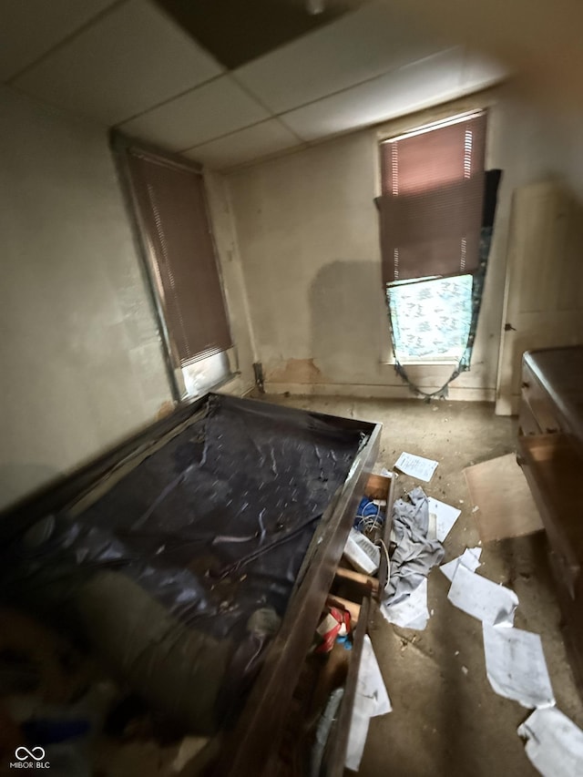 miscellaneous room featuring a drop ceiling