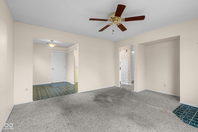 carpeted empty room with ceiling fan